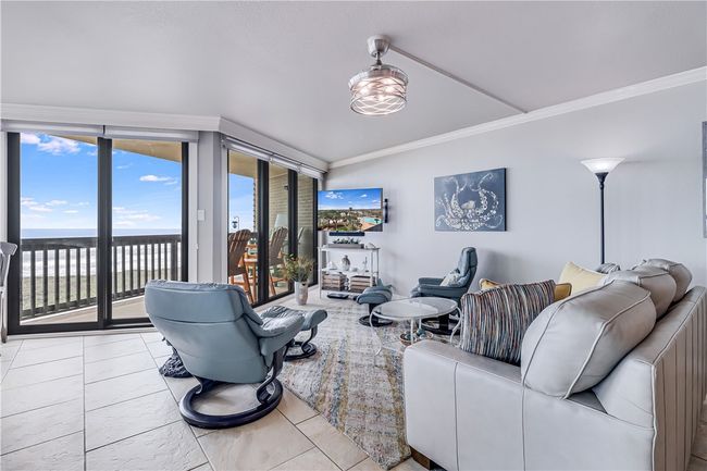 Spacious living area with great views. | Image 10