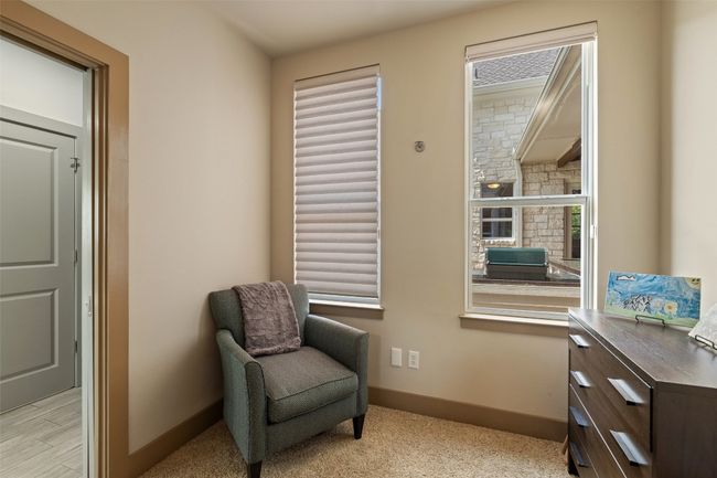 Sitting room with baseboards | Image 29