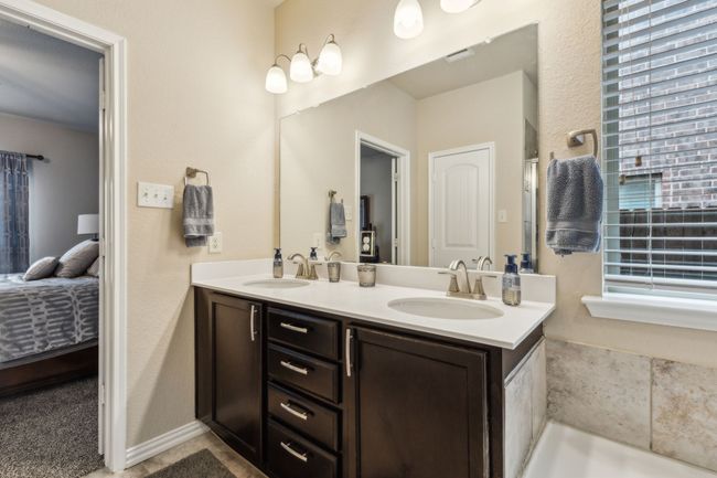 Full bath with double vanity and connected bathroom | Image 16