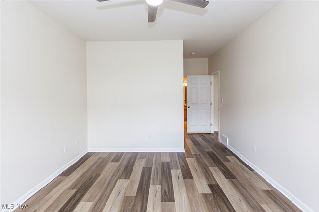 bedroom with new flooring | Image 18