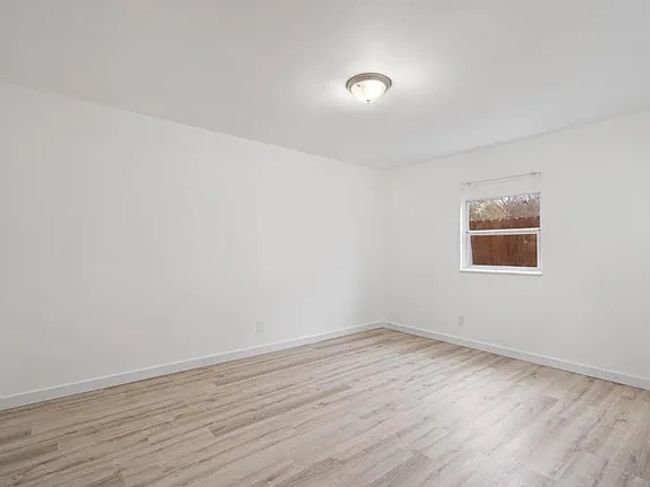 Unfurnished room featuring light wood-style flooring and baseboards | Image 19