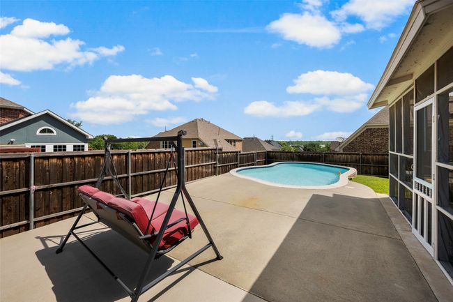 Screened in porch and pool | Image 36