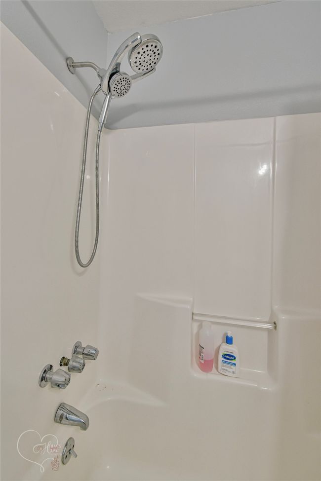 Full bath featuring washtub / shower combination | Image 14