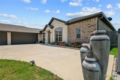 This half acre corner lot with oversized driveway is a Salado oasis! | Image 2