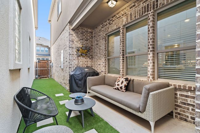 View of patio featuring a grill and an outdoor living space | Image 24