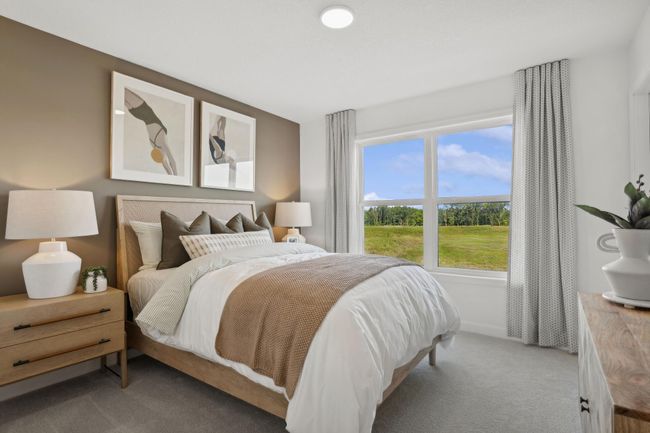 (Photo of a decorated model, actual homes finishes will vary) Another secondary bedroom on the upper level. | Image 20