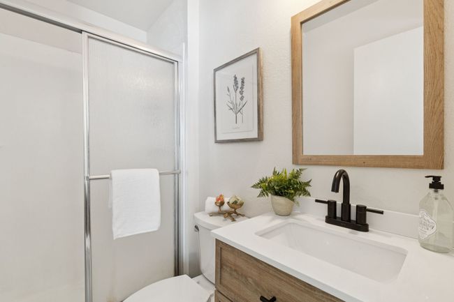 En-Suite Primary Bathroom featuring vanity and a shower stall | Image 10