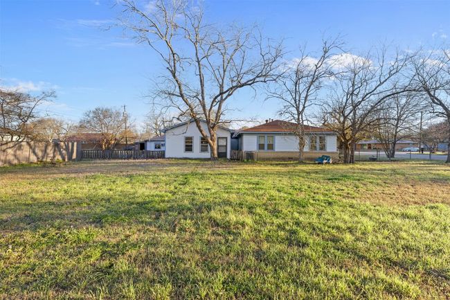 View of yard featuring fence | Image 6