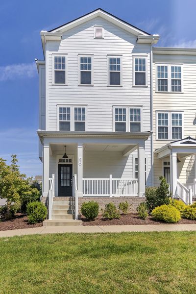 Just out your front door to this grass walkway. Perfect if you have pets to walk! | Image 2