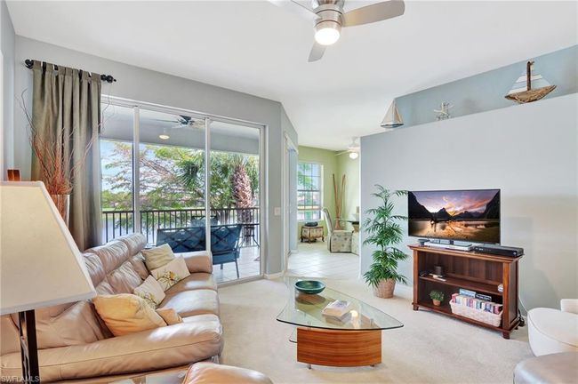 Spacious living room overlooking the lake | Image 9