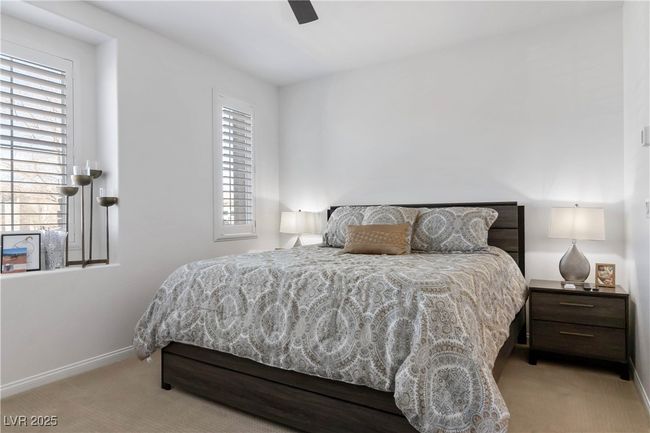 Bedroom featuring ceiling fan, carpet flooring, and baseboards | Image 28