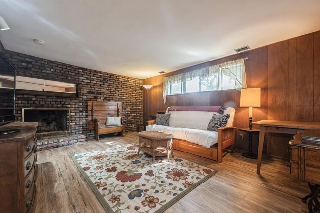 Lower Level Family room with Fireplace | Image 17