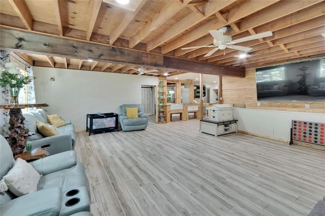 All of the wood on the walls was taken from the ceiling. It's original to the house | Image 11