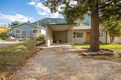 View of front facade with a mountain view and a carport | Image 3