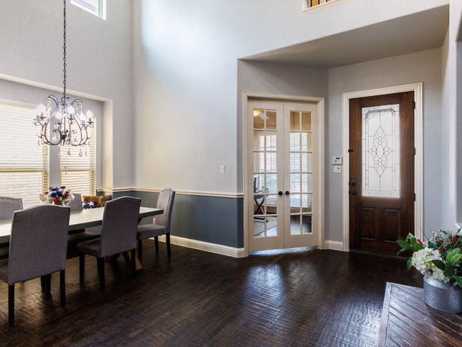 An open front entryway that welcomes you with sleek hardwood flooring. | Image 6