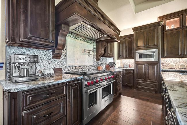 48" Wolf Range with grill and griddle. | Image 19