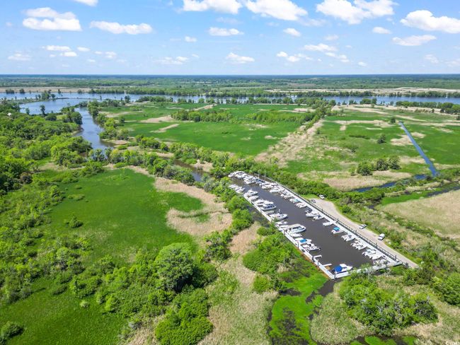 Bird's eye view with a water view | Image 39