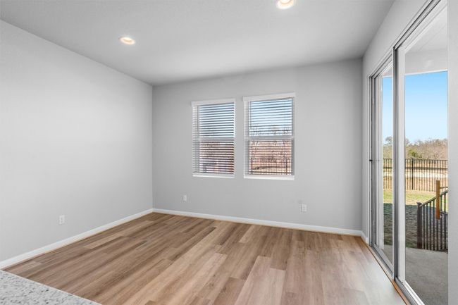 Spare room with light wood finished floors and recessed lighting | Image 13