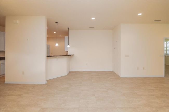 Living area with Kitchen pass through | Image 7