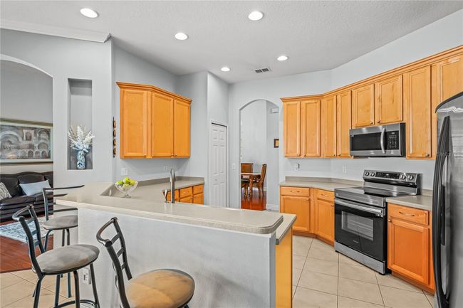 12801 Stanwyck Cir, House other with 4 bedrooms, 3 bathrooms and null parking in TAMPA FL | Image 12