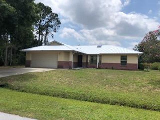 872 New Zealand Avenue Nw, House other with 3 bedrooms, 2 bathrooms and null parking in Palm Bay FL | Image 3