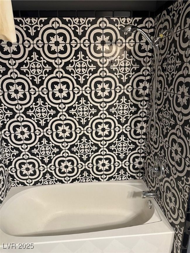 Bathroom with a bathtub | Image 7