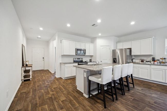 922 Forest Vw, House other with 5 bedrooms, 3 bathrooms and 3 parking in New Caney TX | Image 9