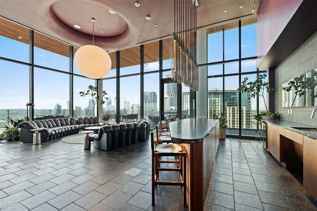 Lobby with a sink and a view of city | Image 21
