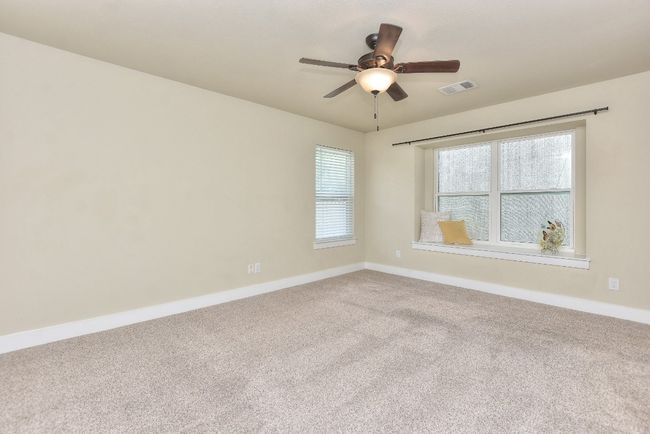 Primary with lots of natural light. Window shade installed on the outside. | Image 19