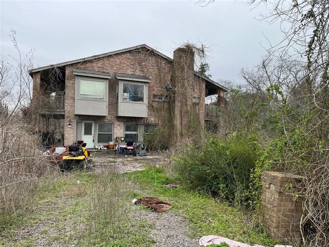 Some repairs were started and the owner passed away. The house and property are full of personal belongings. What you see is what you get. | Image 19