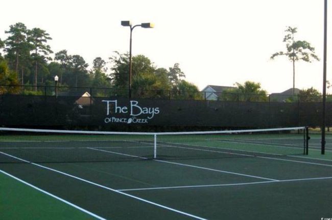 View of sport court featuring fence | Image 31