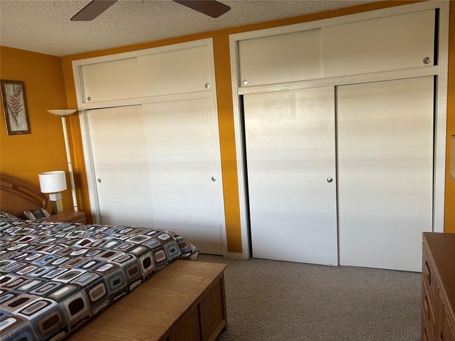 BEDROOM-WALL OF CLOSETS | Image 19