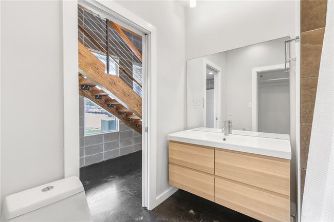 Bathroom featuring vanity and toilet | Image 30
