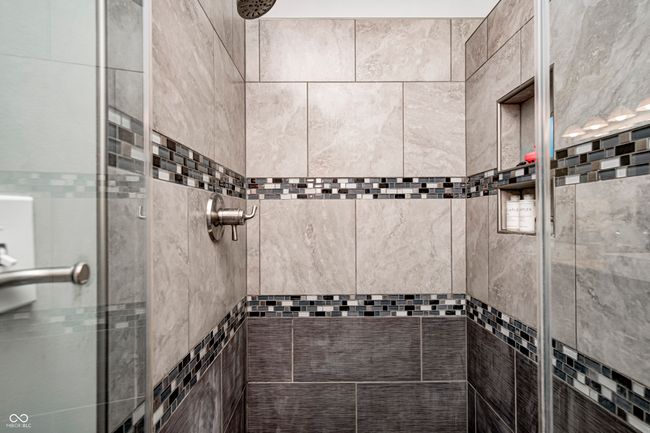 Tiled walk-in shower with sleek design | Image 29