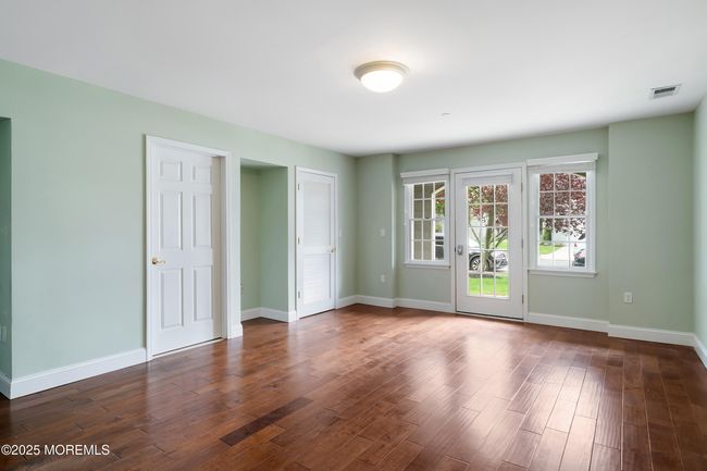 Level one - can be used as a bonus room or bedroom - full bath and 2 closets | Image 5