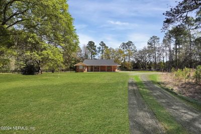 48206 Meridian Trail, House other with 4 bedrooms, 3 bathrooms and null parking in Hilliard FL | Image 2