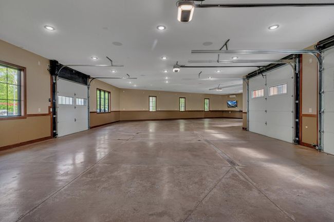 Fully Finished garage with lots of outlets | Image 88
