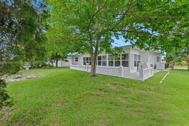 6905 Nw 73 Rd St, House other with 2 bedrooms, 2 bathrooms and null parking in Tamarac FL | Image 23