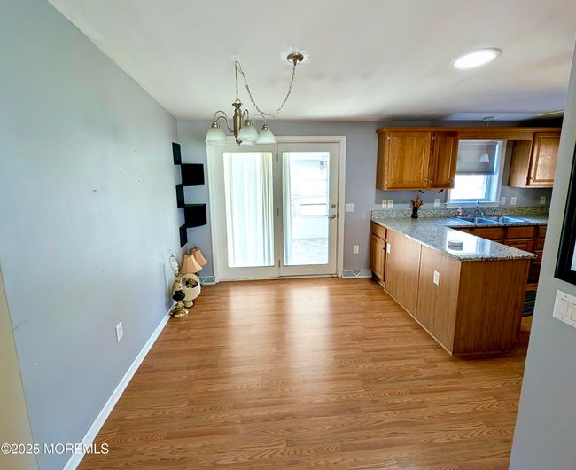 Dining Area with Slider to Porch | Image 21