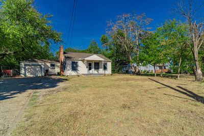 View of yard featuring a garage | Image 3