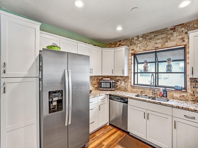 2160 Ne Coachman Rd, House other with 3 bedrooms, 2 bathrooms and null parking in Clearwater FL | Image 9