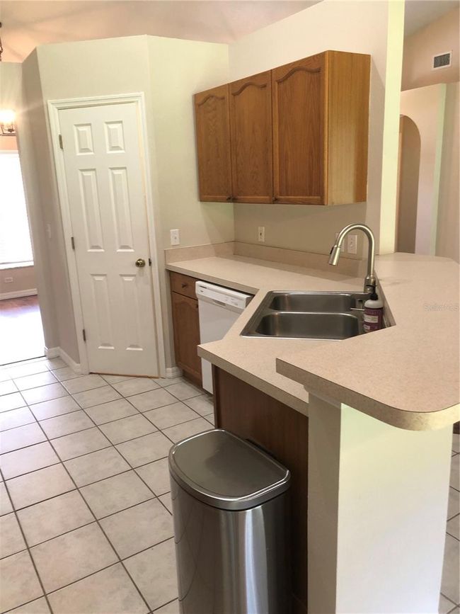 KITCHEN WITH DISHWASHER AND PANTRY | Image 9