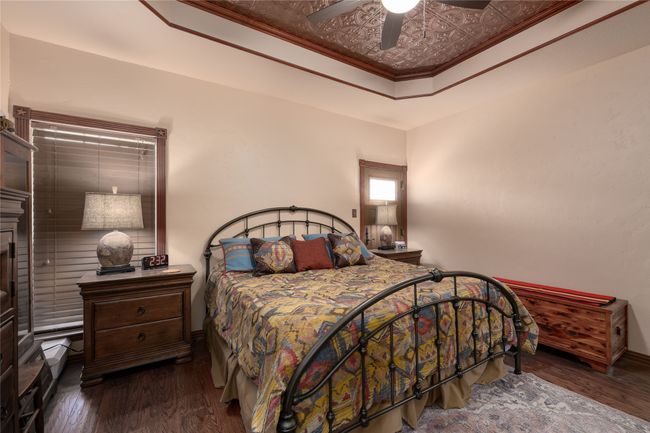 Primary bedroom with trayed ceilings | Image 32