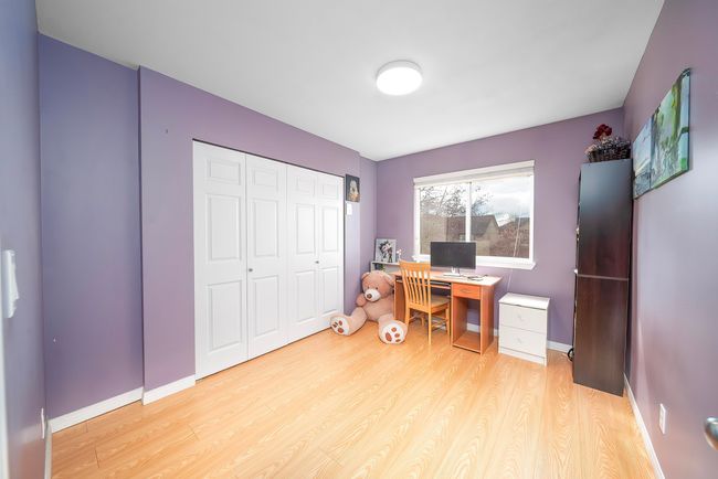 Office space with baseboards and wood finished floors | Image 31