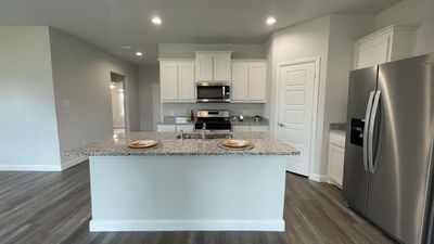 Kitchen - All Home and community information, including pricing, included features, terms, availability and amenities, are subject to change at any time without notice or obligation. All Drawings, pictures, photographs, video, square footages, floor plans, elevations, features, colors and sizes are approximate for illustration purposes only and will vary from the homes as built. | Image 2