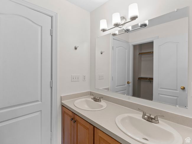 Bathroom featuring double vanity | Image 20