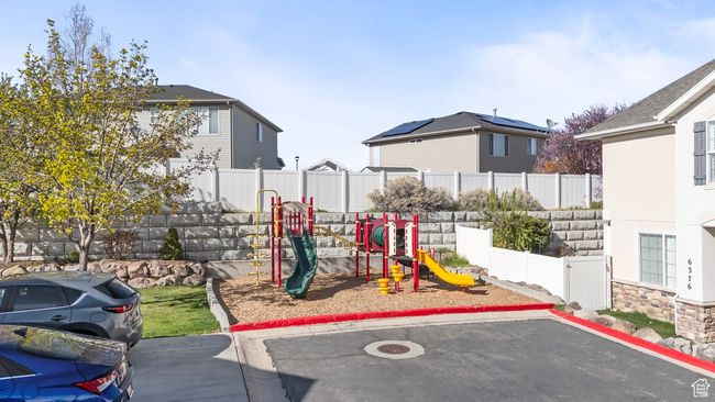 View of play area featuring fence | Image 18