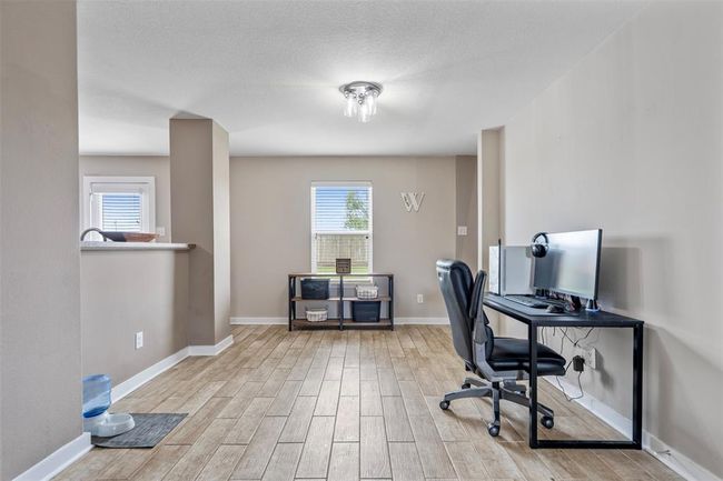 Open to kitchen dining area | Image 10