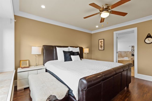 Bedroom featuring ornamental molding, dark wood-type flooring, recessed lighting, baseboards, and a ceiling fan | Image 20