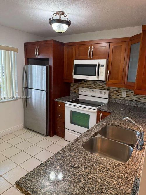 508-8610 N Sherman Cir, Miramar, FL, 33025-2039 | Card Image